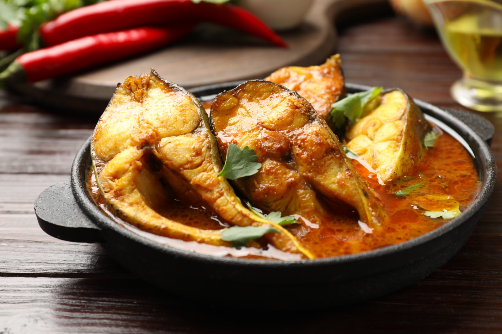 Apollo Fish - Golden crispy fish fillets tossed with green chilies and fresh curry leaves